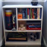 F12. White laminate bookshelf. 33&rdquo;h x 30&rdquo;w x 15&rdquo;d  